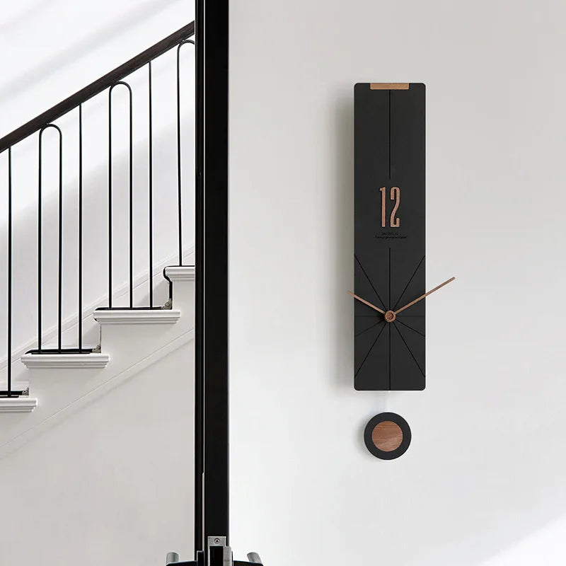 horloge murale noir balancier atmosphere maison